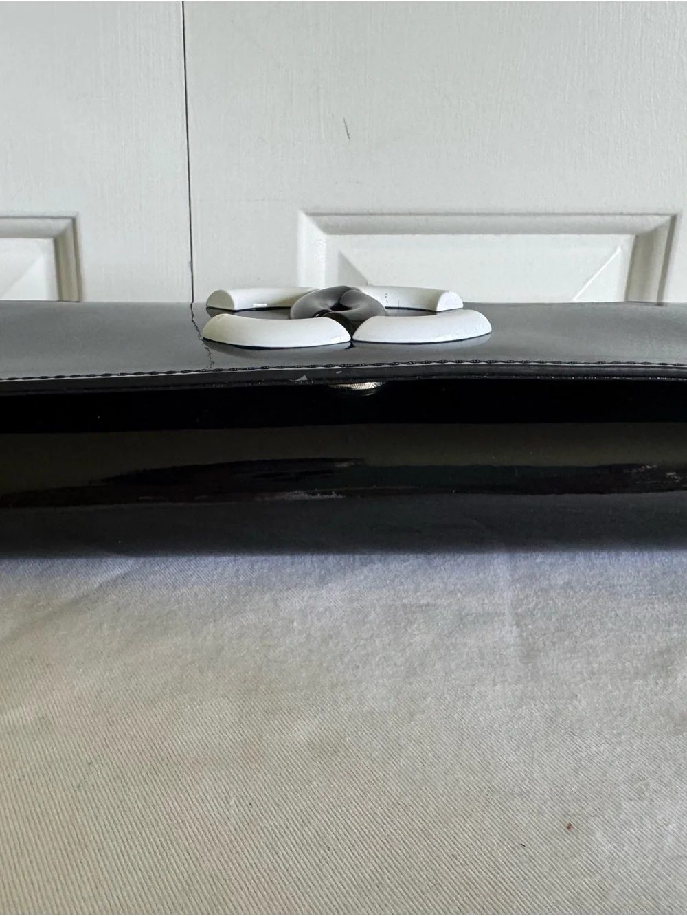 Black Patent Leather Wristlet Clutch with White CC Emblem